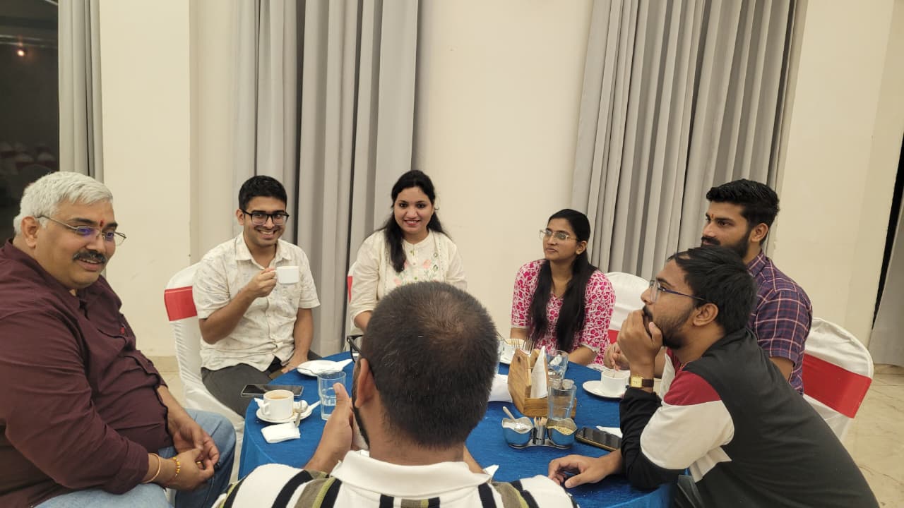 STLab researchers discussing core ideas over Chaye Pe Charcha